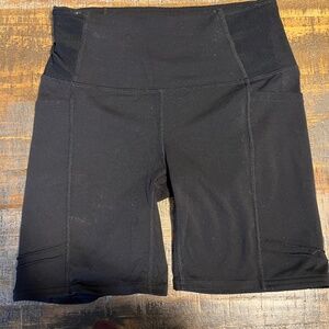 Oiselle black pocket jogger shorts size 4